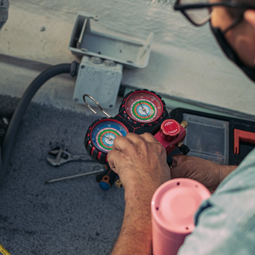 HVAC technician on an emergency repair call